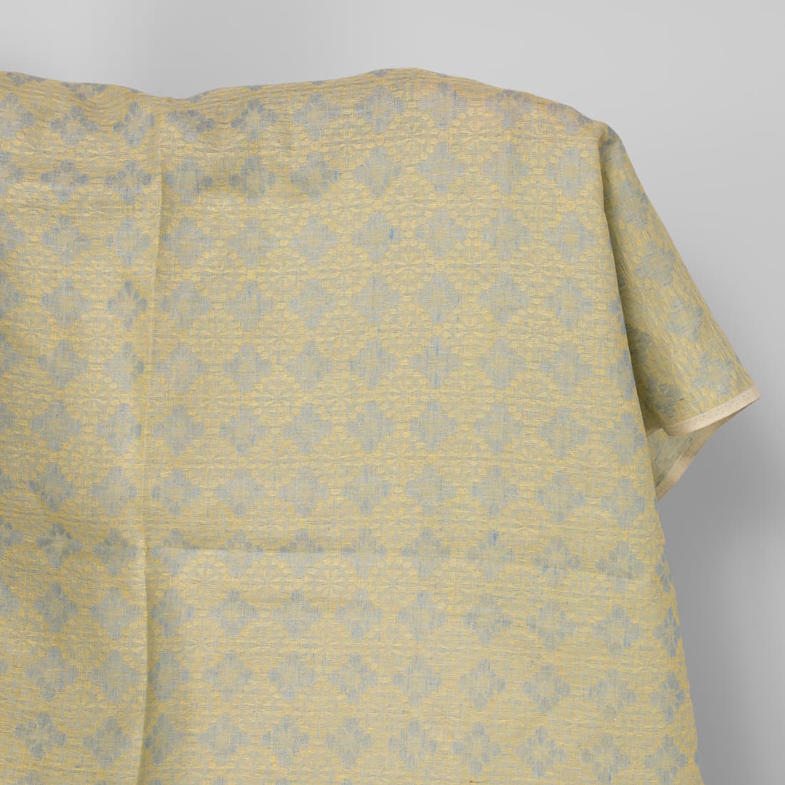 Linen fabric in light blue and yellow floral jacquard