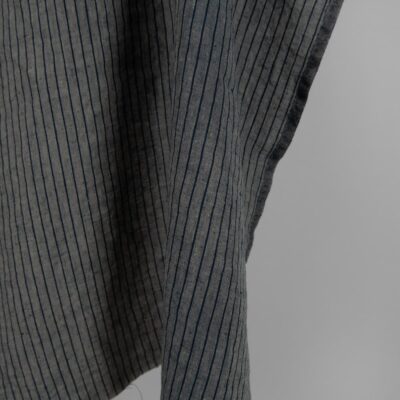 Washed linen fabric grey with thin black stripes 7 Washed linen fabric grey with thin black stripes edge