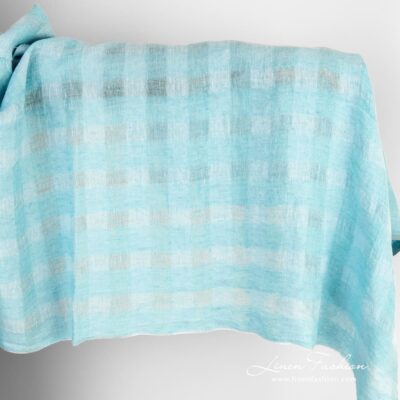 Light blue linen fabric in transparent checks washed 6 Light blue linen fabric