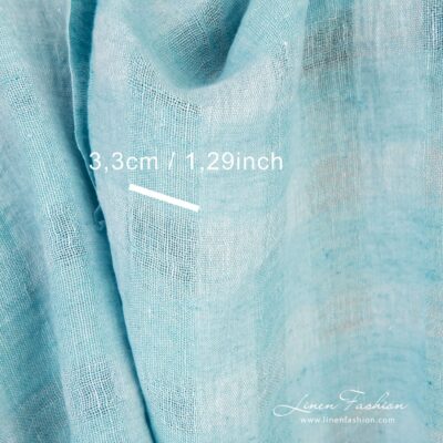Light blue linen fabric in transparent checks washed 10 Light blue linen fabric, specially washed to increase softness