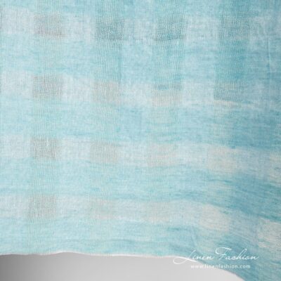 Light blue linen fabric in transparent checks washed 8 Light blue linen fabric in transparent checks