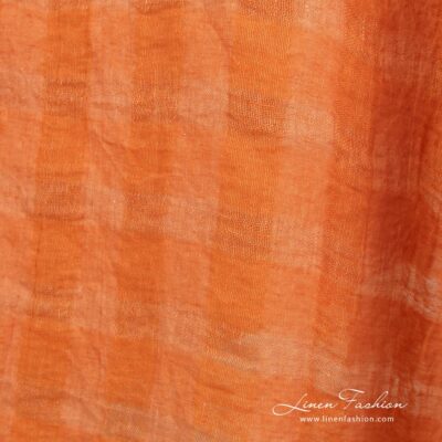 Orange linen fabric in transparent checks, perfect for clothes, curtains, scarves, tablecloths