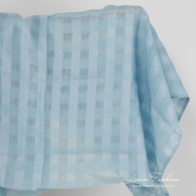Linen fabric with checks in aquamarine colour 5 Linen fabric with checks in aquamarine colour.