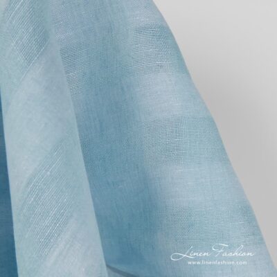Linen fabric with checks in aquamarine colour 7 Checked linen fabric in aquamarine colour.