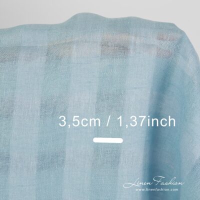 Linen fabric with checks in aquamarine colour 8 100% linen fabric in checks, aquamarine.