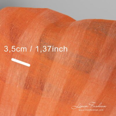 Orange dyed 100% linen fabric.