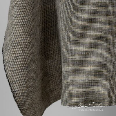 Washed 100% linen fabric in checks.