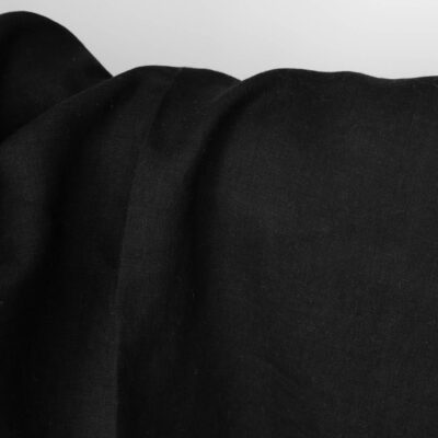 Washed linen fabric solid black colour 7 Washed linen fabric solid black colour close up view