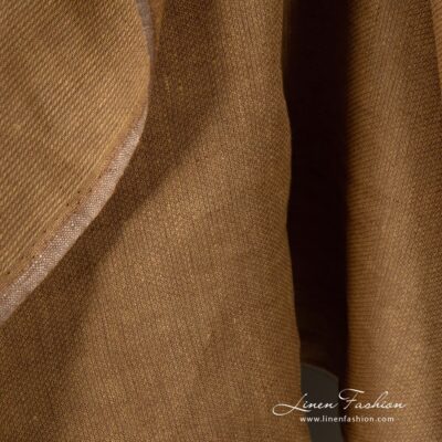 Patterned 100% linen fabric in brown melange.