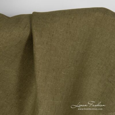 Moss green linen fabric in diagonal pattern 6 Moss green dyed linen fabric in diagonal pattern.