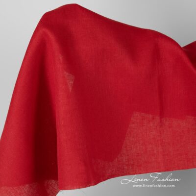 Solid red linen fabric in diagonal pattern 5 Solid red linen fabric in diagonal pattern.