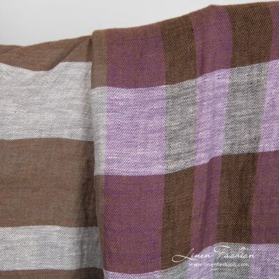 Linen fabric in violet and brown stripes, specially washed to increase softness