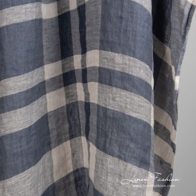 Linen fabric in grey stripes washed 7 Linen fabric in stripes, woven from several shades of grey, natural linen, black and white color yarns