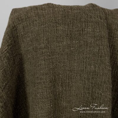 Washed linen fabric in moss green.