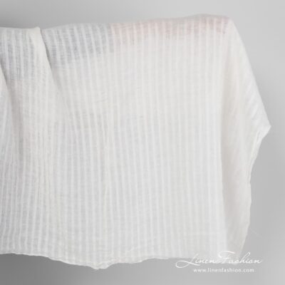 Washed off-white striped linen fabric 5 Washed off white striped linen fabric.