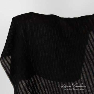 Washed black striped linen fabric.