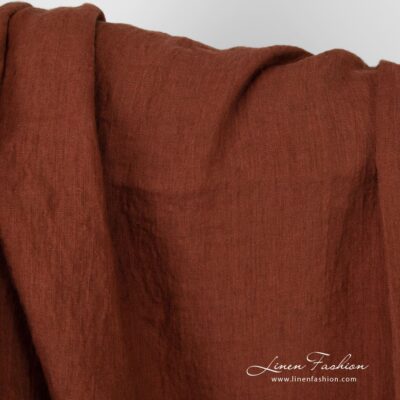 Cinnamon brown linen fabric with red tones
