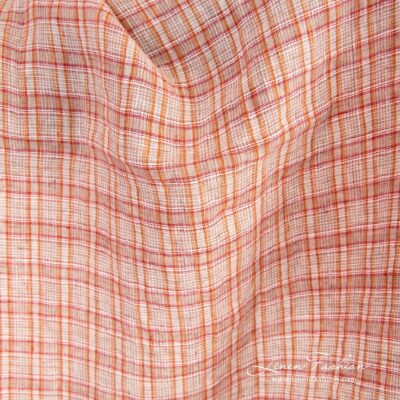 Orange linen fabric in checks washed 6 Orange linen fabric in checks, specially washed to increase softness