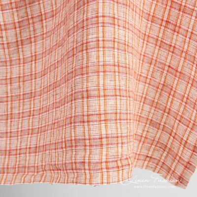 Orange linen fabric in checks washed 7 Orange linen fabric in checks, specially washed, for home textile and clothes
