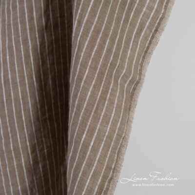Brown linen fabric in stripes, specially washed to increase softness