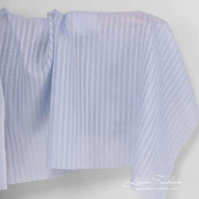 Light blue linen fabric with open weave pattern.