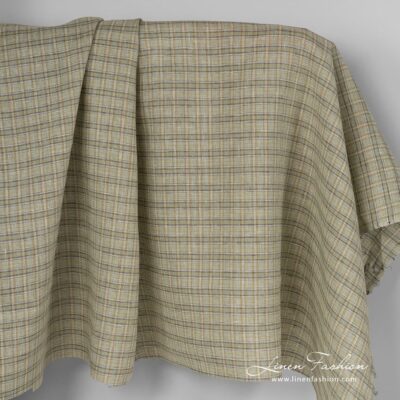 Checked linen fabric in green colour.