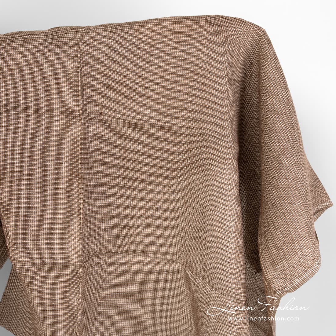 Linen fabric in brown waffle checks.
