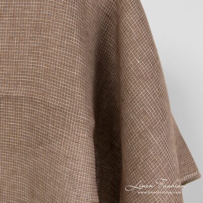 Waffle checked linen fabric in brown colour.