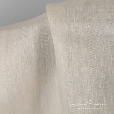 Patterned 100% linen fabric in ecru.