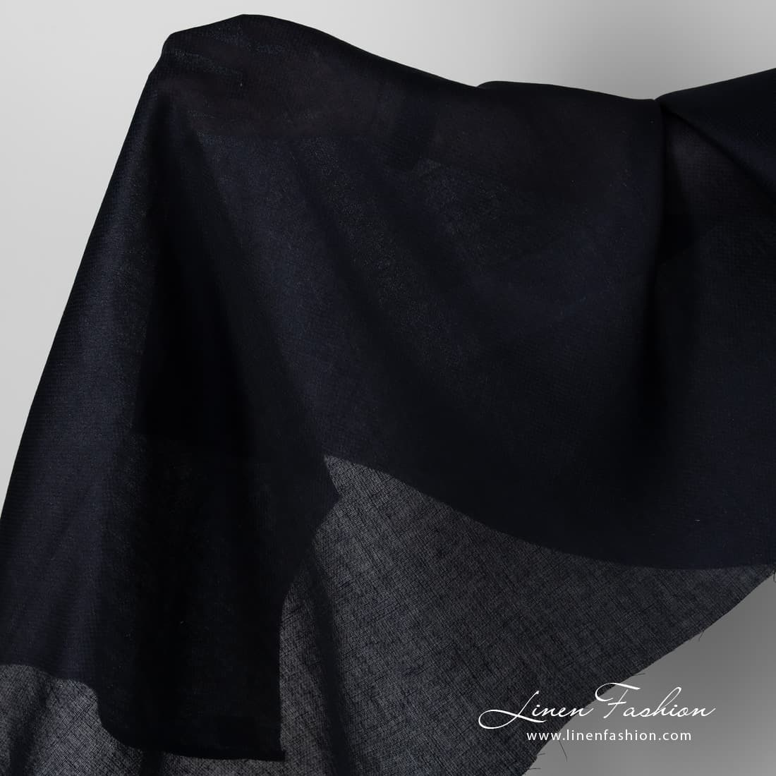 Patterned midnight blue linen fabric.
