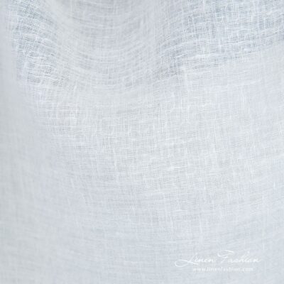 White linen fabric in dobby pattern with diamonds