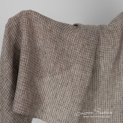Linen fabric in brown checks, washed.