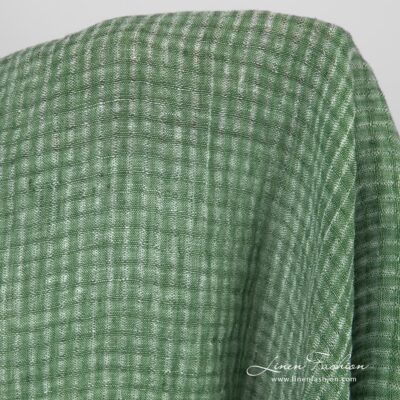 Washed green open weave checked linen fabric 7 Green openweave linen fabric with transparent checks
