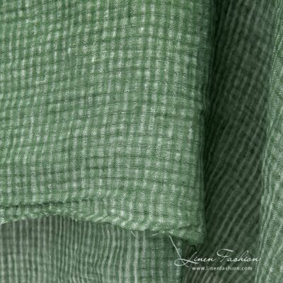 Washed green open weave checked linen fabric 8 Green openweave linen fabric with transparent checks, washed fabric
