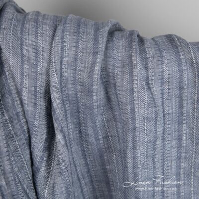 Blue grey linen fabric in vertical stripes, specially washed to increase softness