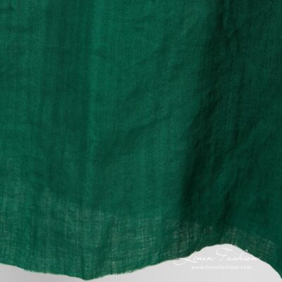 Green linen fabric in twills, specially washed to increase softness