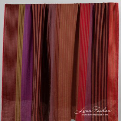 Linen fabric in red stripes washed 9 Linen fabric in vertical stripes, woven from black, brown, green and violet yarns