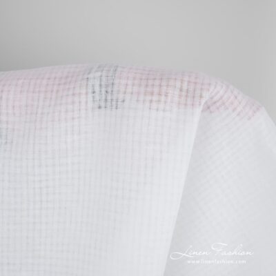 Optical white linen fabric in transparent checks, perfect for shawls, scarves, tablecloths and curtains