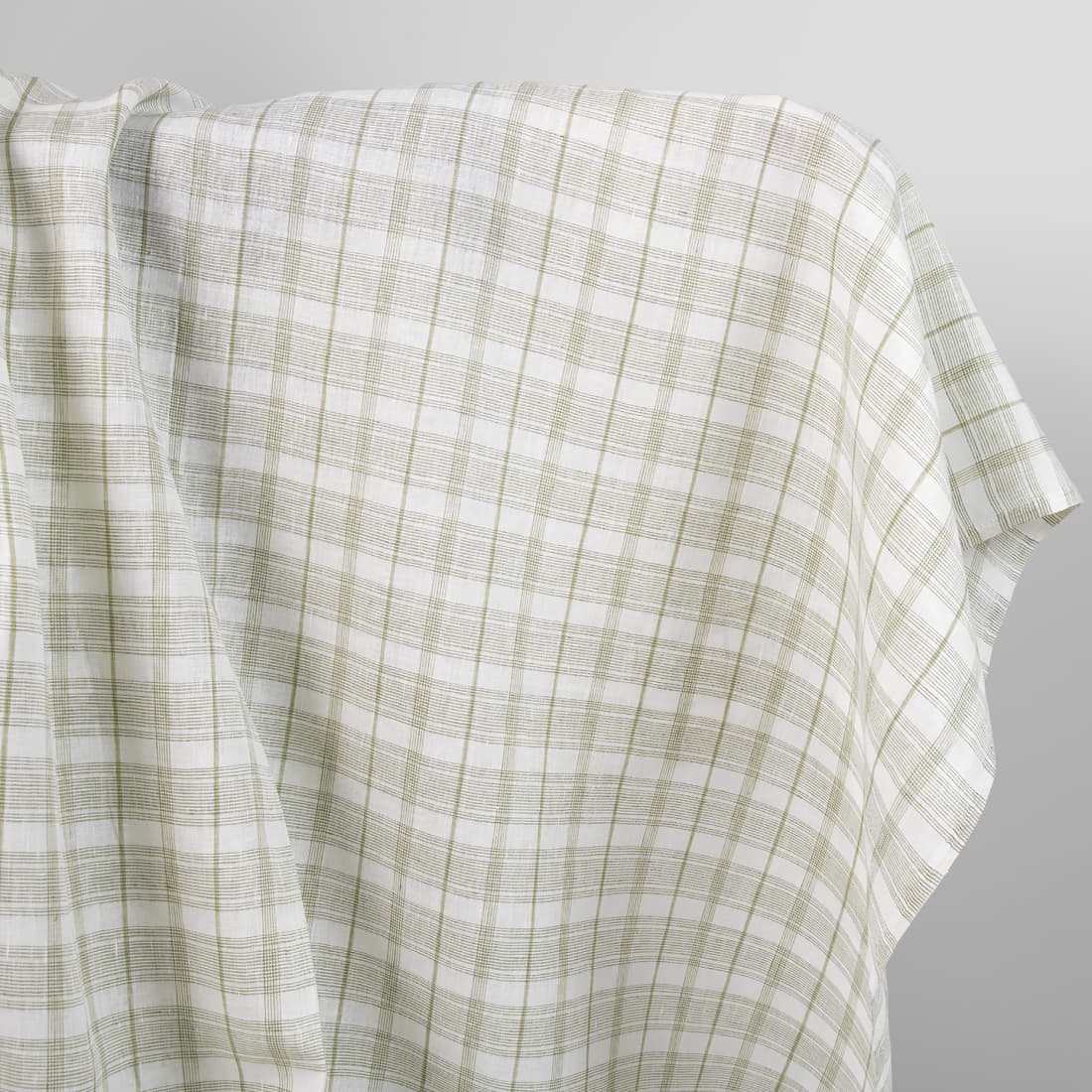 Linen fabric off-white with light olive green checks