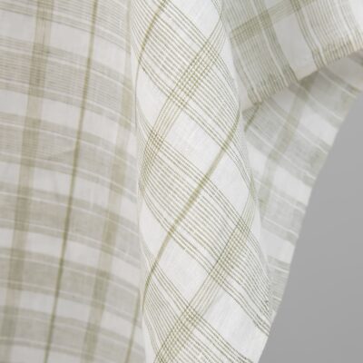 Linen fabric off-white with light olive green checks edge