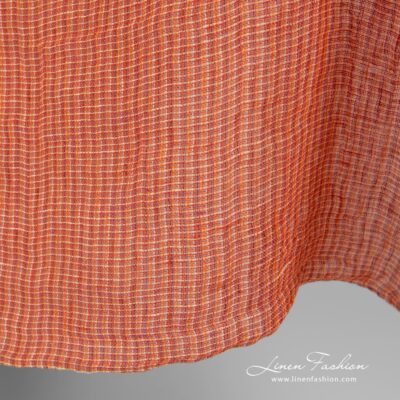Transparent linen fabric in orange melange washed 7 Linen fabric in melange, woven from orange, red and yellowish yarns