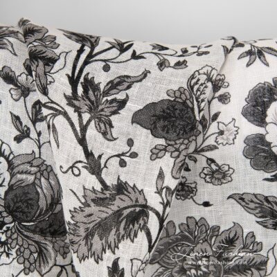 100% linen fabric decorated with black flowers.