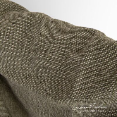 Moss green linen fabric in plain weave