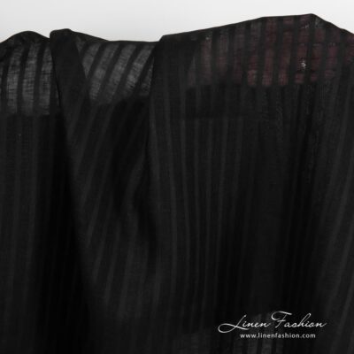 Lightweight black linen fabric.