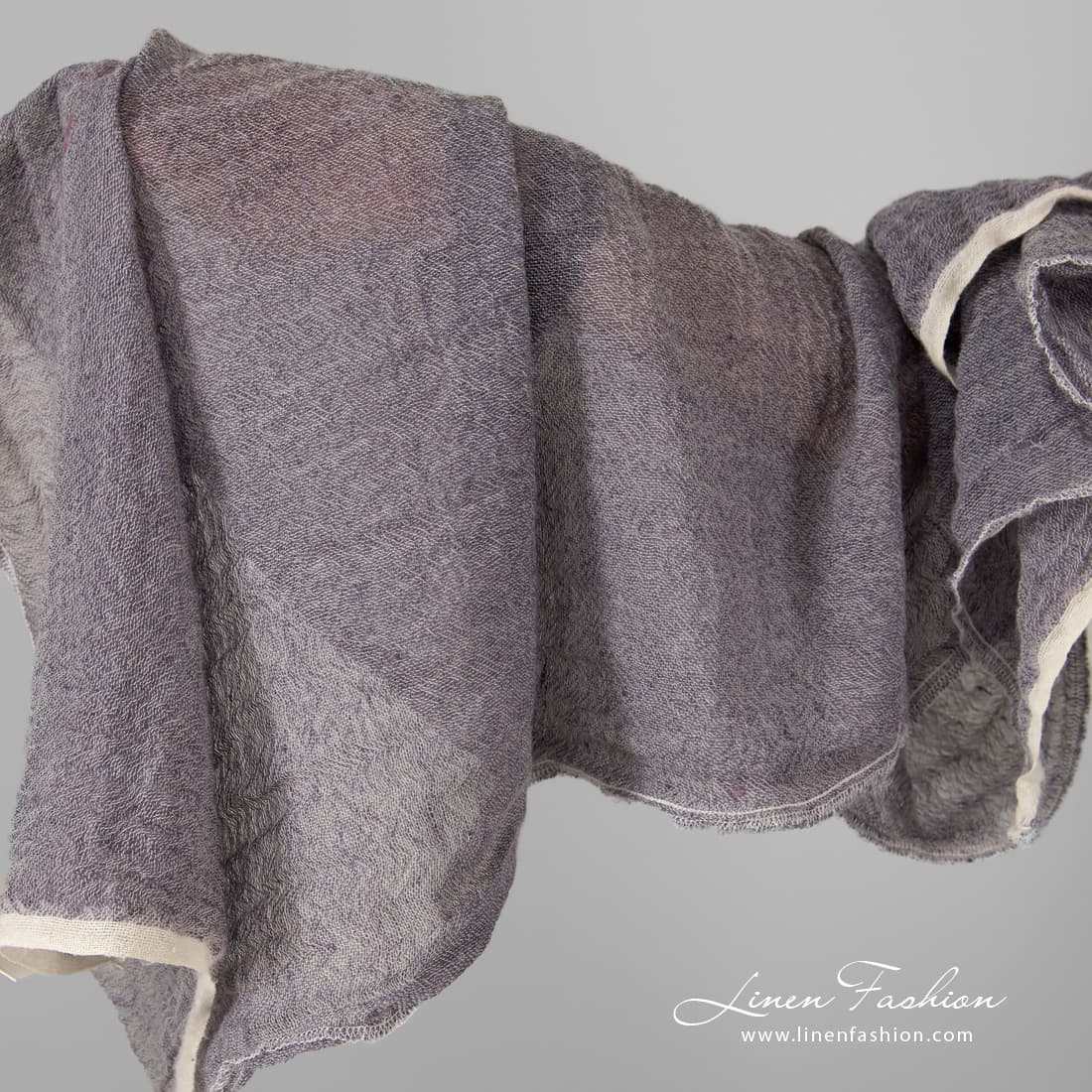 Linen wool violet fabric, washed.
