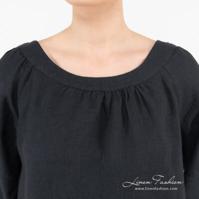 navy linen blouse with rounded neck.