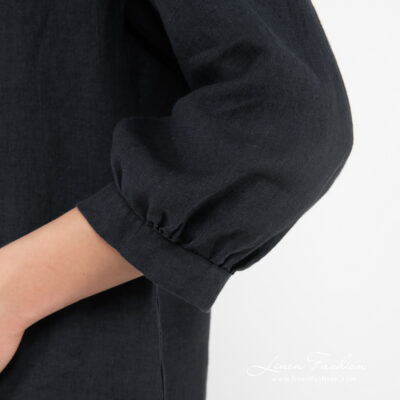 navy linen blouse, cuff pleated.