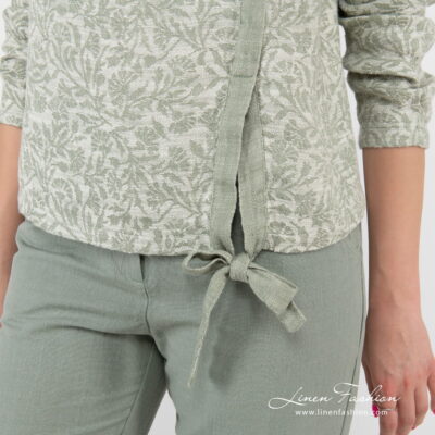 CYBIL Blouse green 11 green flower blouse with knotted ribbom at bottom.