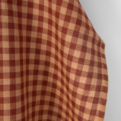 Linen fabric in red and brown checks, edge