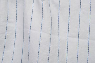 White washed fabric with blue stripes